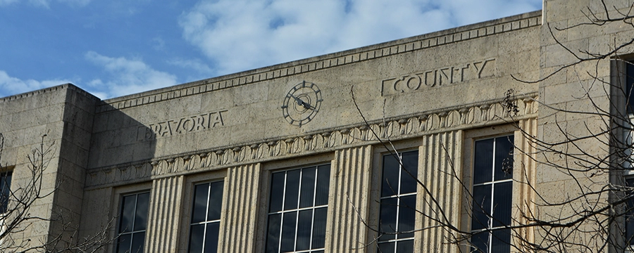 Brazoria-County-Courthouse Brazoria County Courthouse exterior in Angleton, TX with classic stone architecture and tall windows